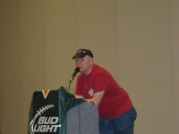 Ken gets the raffle started